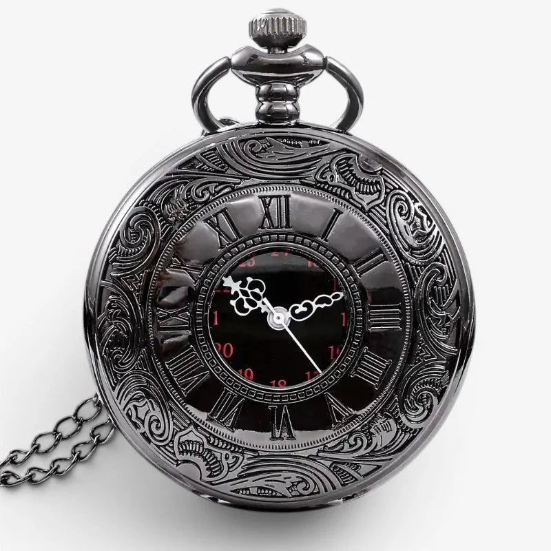 Black ornate gothic pocket watch with roman numerals and chain in metal casing for vintage style use