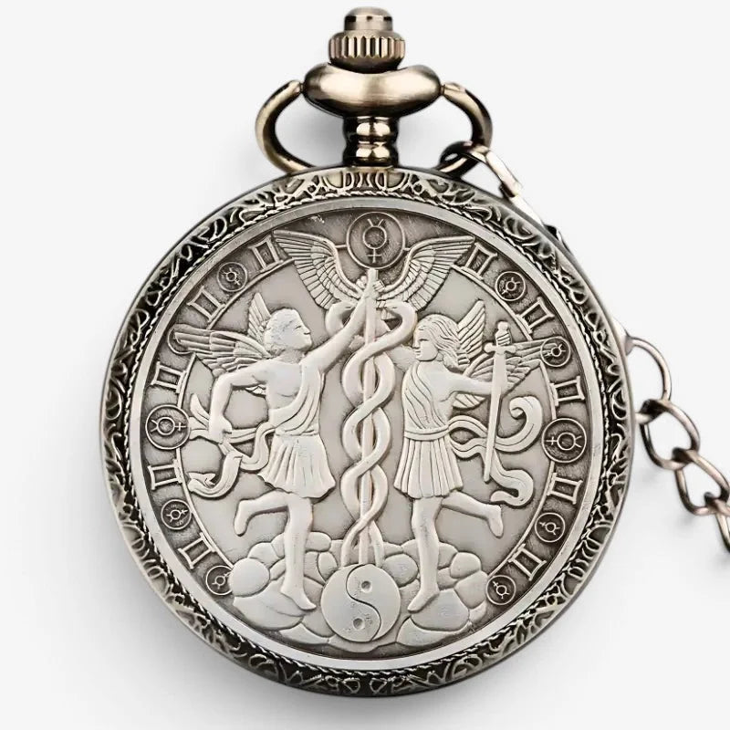 Antique silver-toned horoscope pocket watch with intricate engraved winged figures serpent and celestial symbols on face