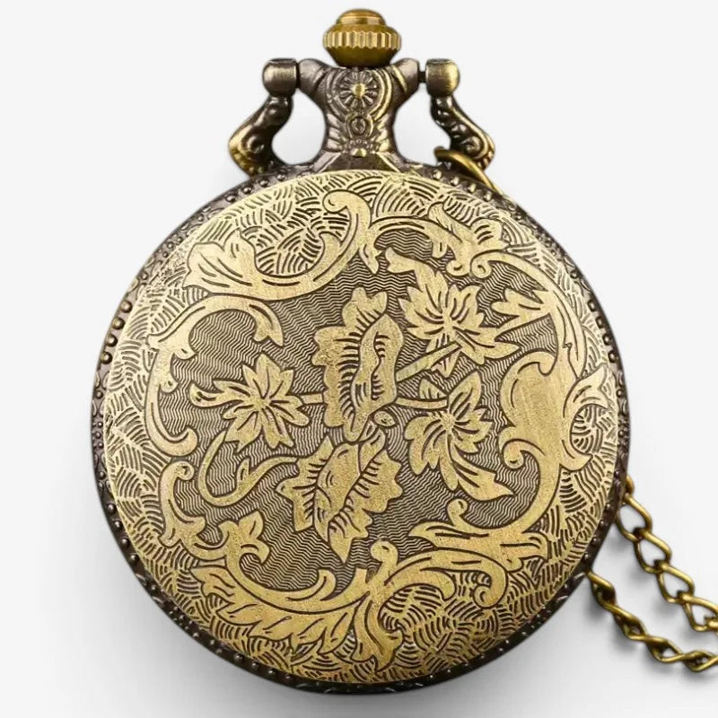 Antique-style brass horse head pocket watch with intricate floral engravings and decorative chain