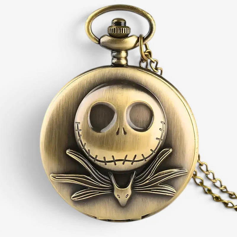 Antique brass jack skellington pocket watch with embossed face and bat wings design on attached chain