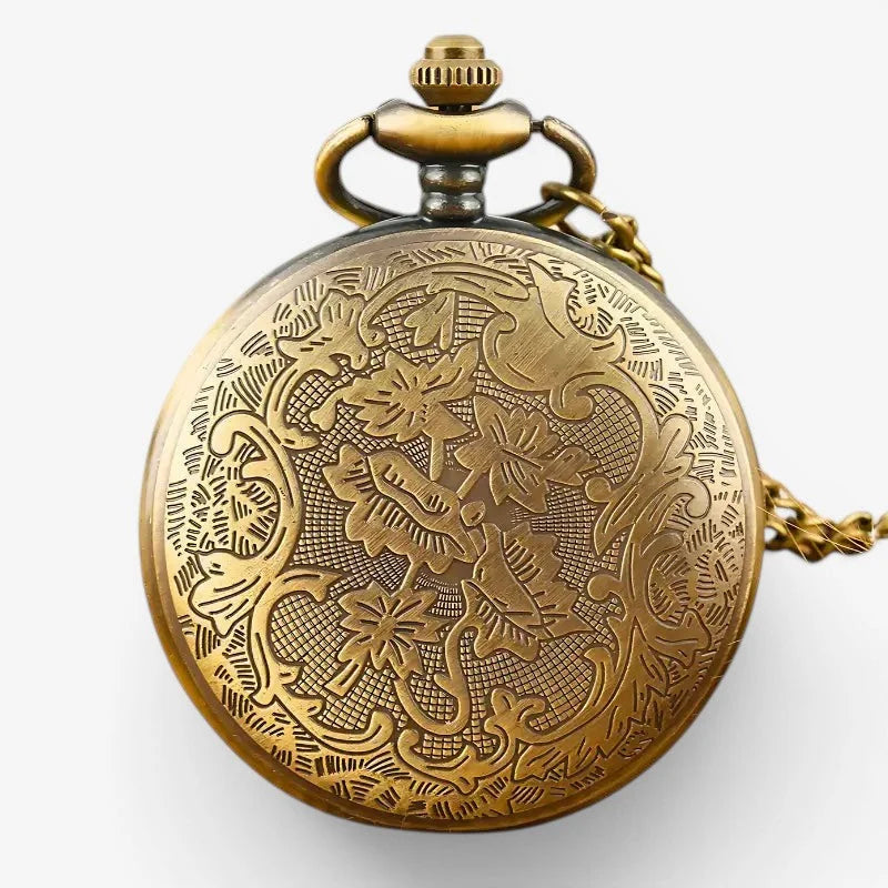 Antique brass ladies pocket watch necklace with intricate floral engraving and matching chain