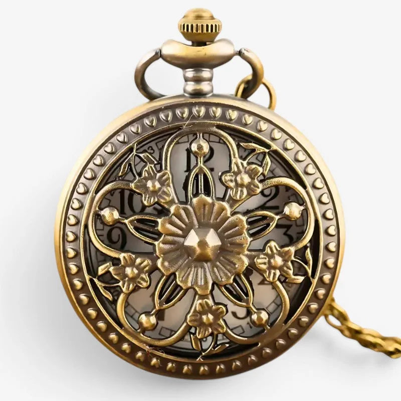 Ladies pocket watch necklace featuring an antique brass pocket watch with intricate floral filigree and matching chain