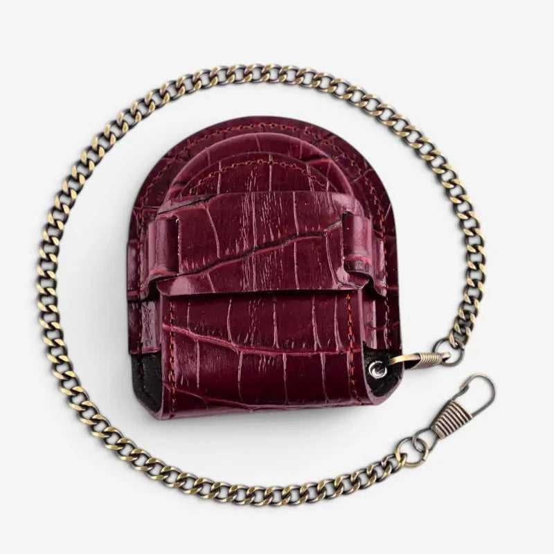 Burgundy crocodile-embossed leather pocket watch case with gold-toned metal chain and clasp for secure carrying