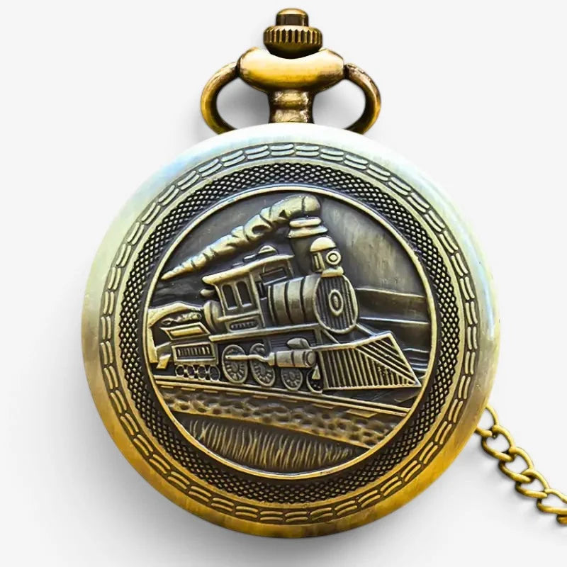 Antique brass locomotive pocket watch with detailed engraved steam train design on the face