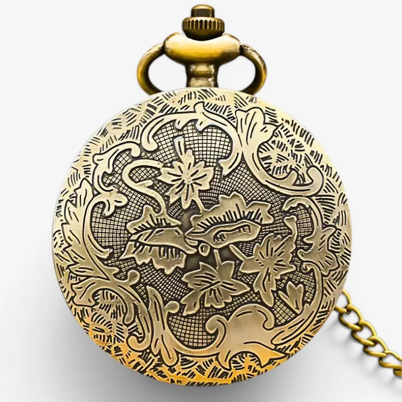 Locomotive pocket watch antique brass with intricate floral vine engraving and matching chain in circular design