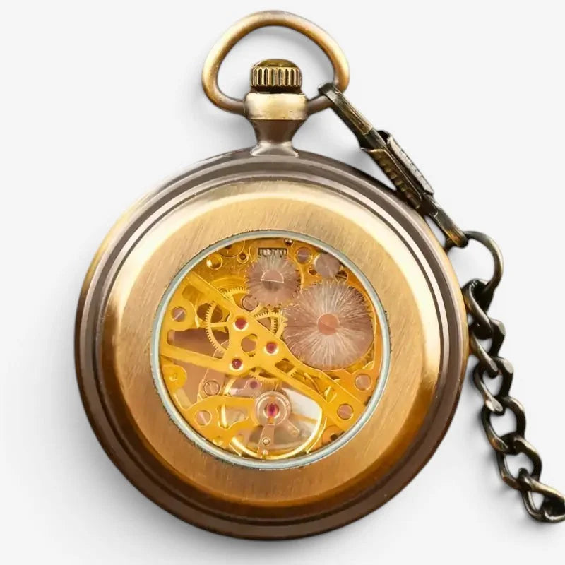 Antique brass manual pocket watch with visible golden gearwork movement and attached dark metal chain