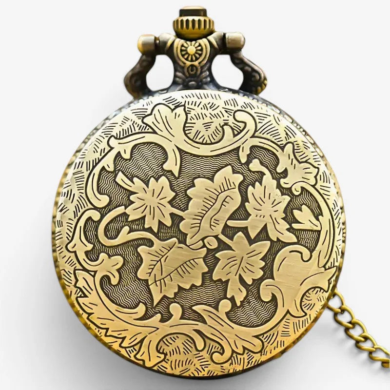 Antique-style brass Mecca Motif pocket watch with intricate floral engravings and a matching chain