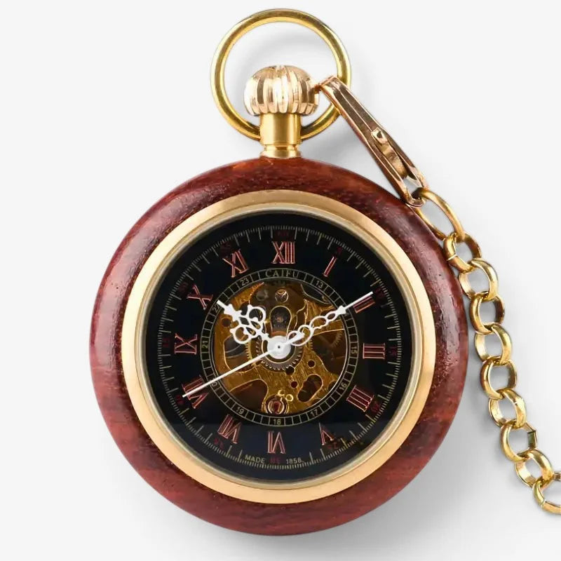 Mechanical wooden pocket watch with a reddish-brown wooden case gold accents and roman numerals on a black face