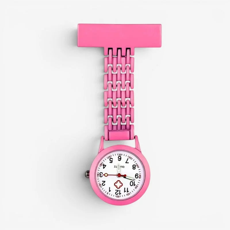 Mens nurse watch in pink with t-shaped clip, interlocking metal band, white face, black numerals, and red hands