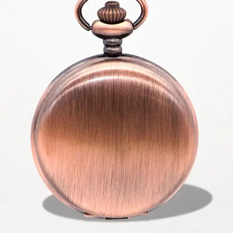 Mens quartz pocket watch with antique-style copper finish, brushed metal surface, and ornate winding crown