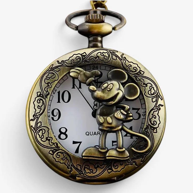 Antique brass-colored mickey pocket watch with raised 3D mickey mouse figure and ornate scrollwork detailing on dial