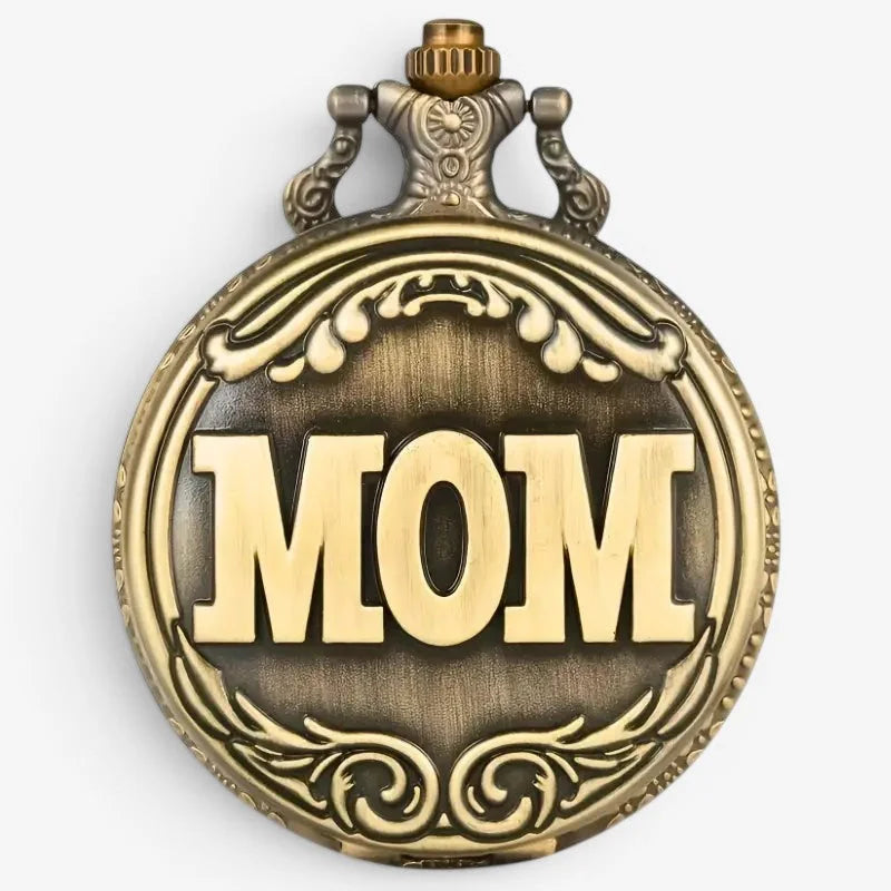 Antique brass-colored mom pocket watch with ornate scrollwork and raised lettering for sentimental gift use