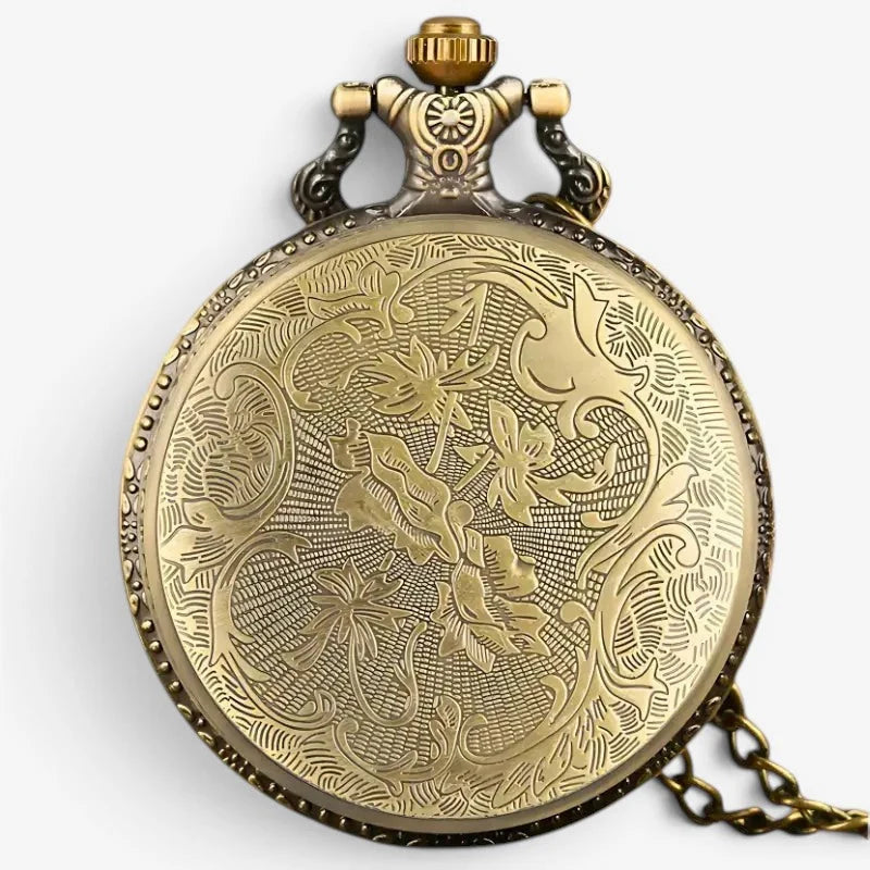 Antique-style brass mom pocket watch with intricate floral engravings and a decorative crown detail