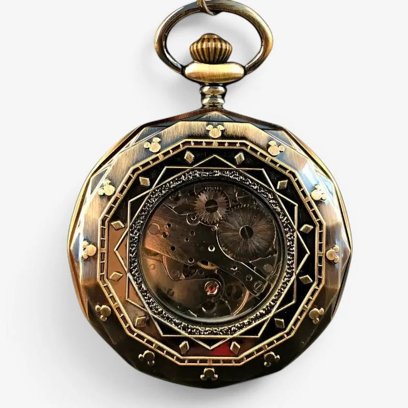 Antique brass moon pocket watch with octagonal case featuring geometric and mickey mouse head motifs and visible mechanical movement