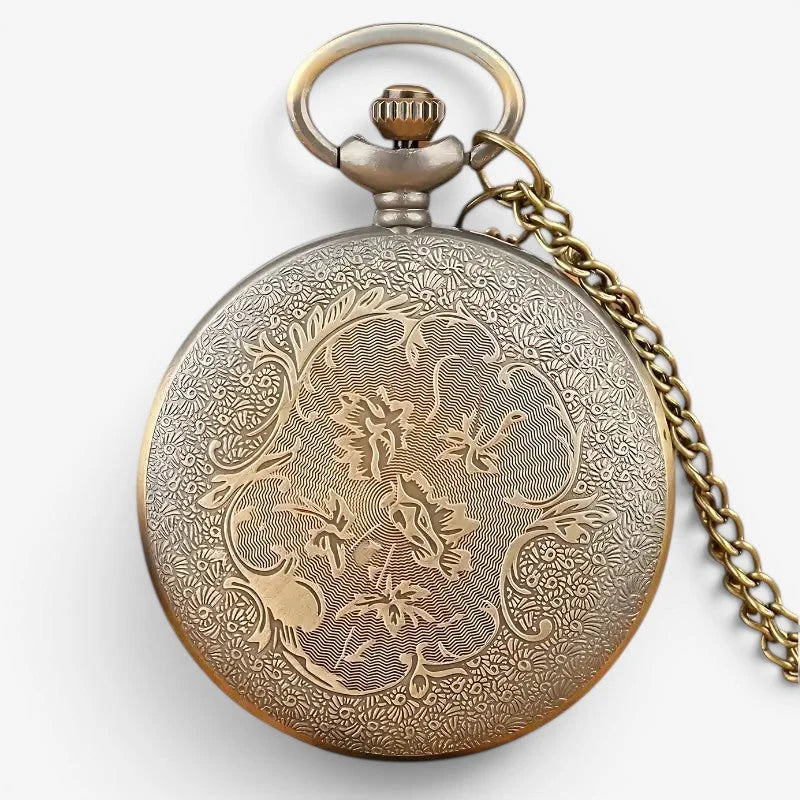 Native Indian pocket watch brass finished with intricate floral and scrollwork engraving on circular face and chain