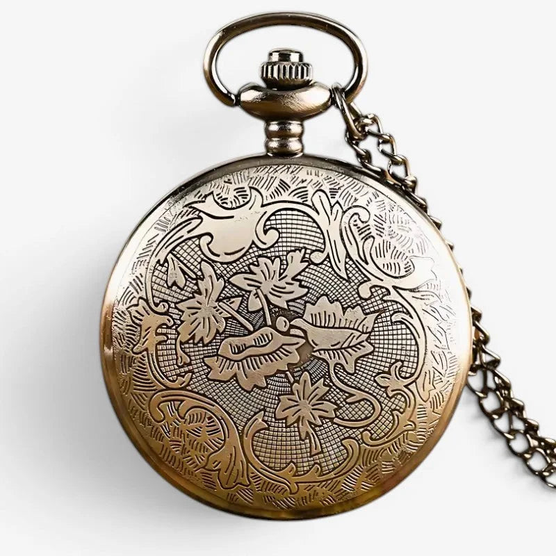 Antique brass octopus pocket watch with intricate floral engraving and matching chain for elegant timekeeping