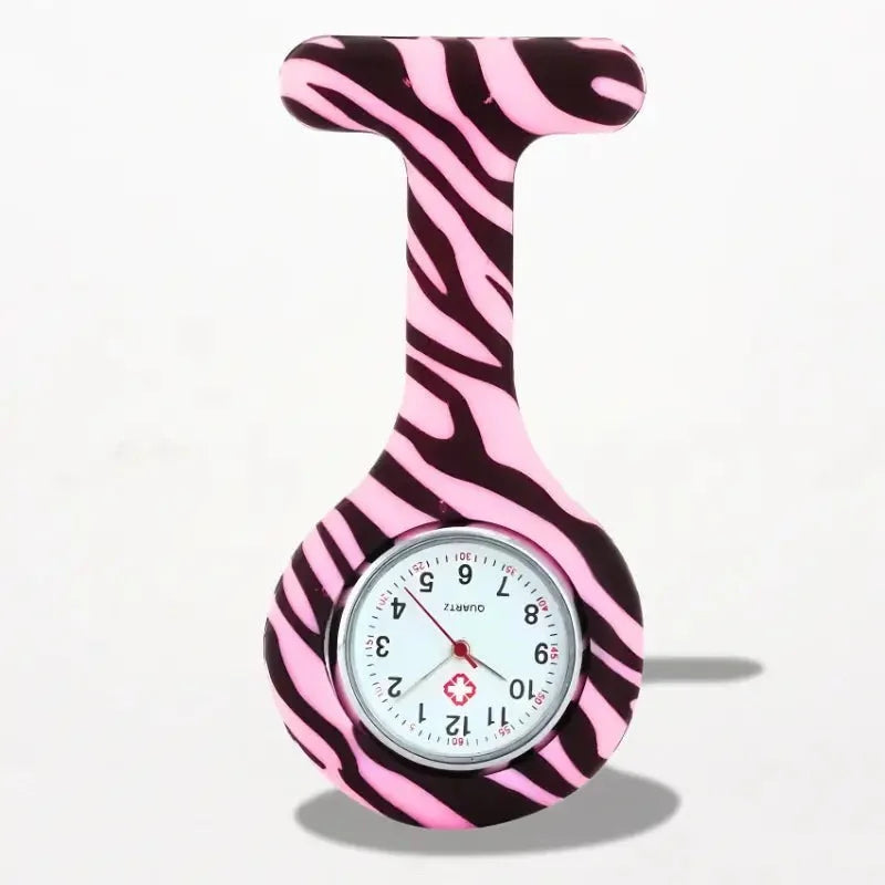 Original nurse watch with pink and black zebra-striped silicone band, white face, red hands, and silver bezel