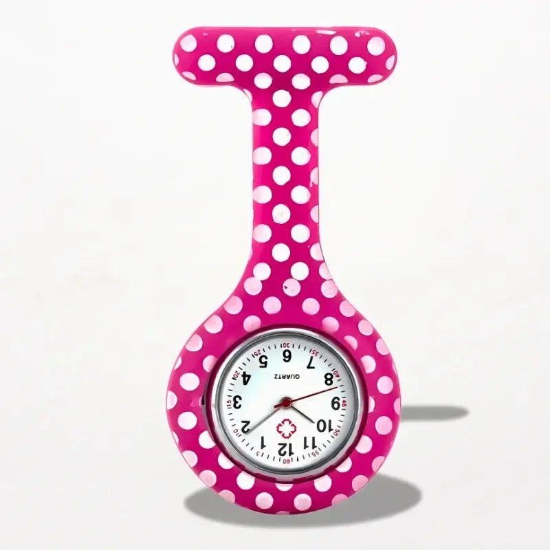 Original nurse watch with a pink polka-dotted design round face and silver-toned hands for medical use