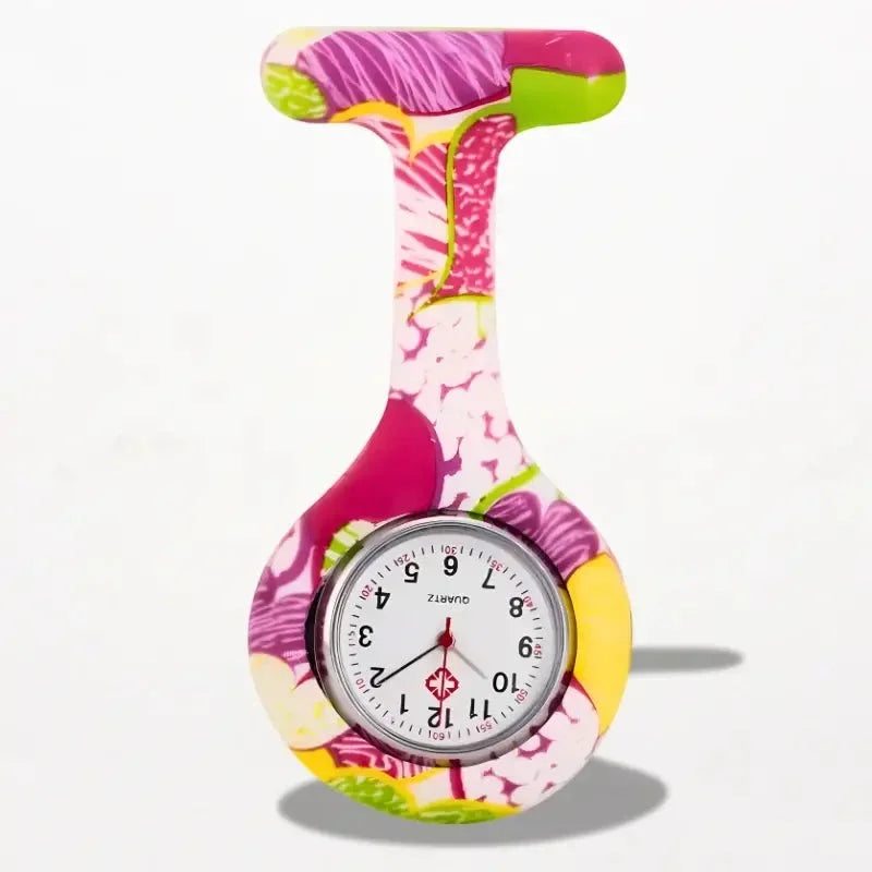 Original nurse watch with a vibrant pink green and yellow floral pattern on its silicone body