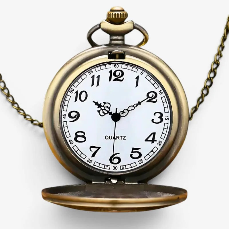 Antique brass peaky blinders pocket watch with white face black numerals and hands on an ornate chain