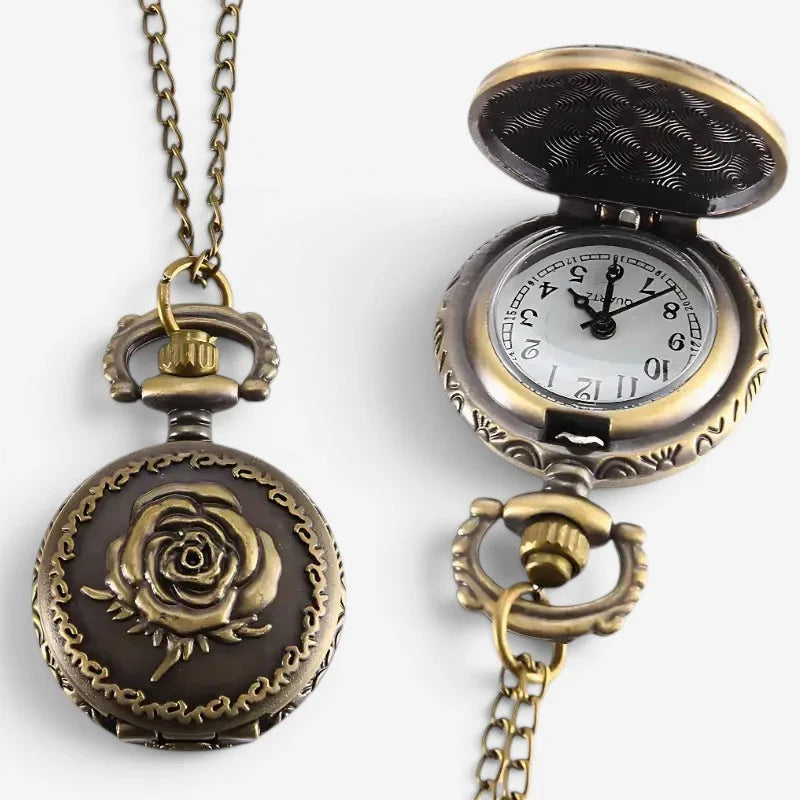 Antique bronze pocket watch necklace with a rose engraving and ornate vintage design on the front