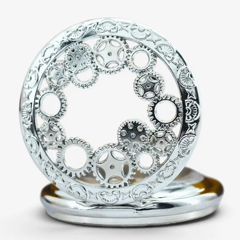 Silver metallic pocket watch stand with intricate gear-themed cut-out patterns and polished reflective finish