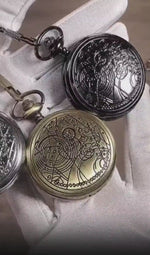 Video showcasing a collection of three ornately engraved pocket watches in silver, black, and antique brass with matching chains.
