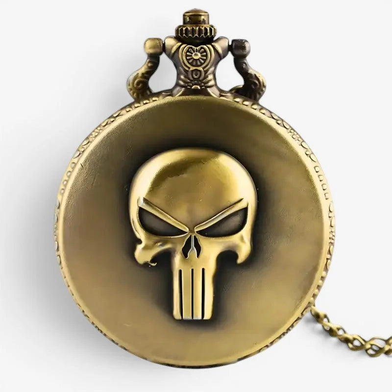 Antique brass-colored Punisher pocket watch with raised skull emblem and ornate vintage-style crown on front face