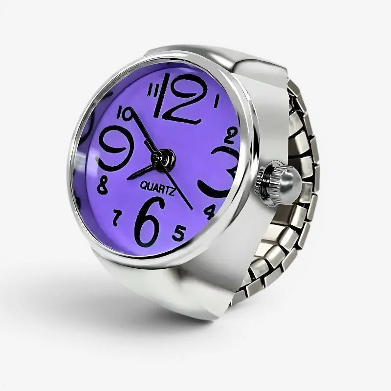 A silver-toned expandable purple ring watch with a vibrant face and bold black numerals for stylish timekeeping