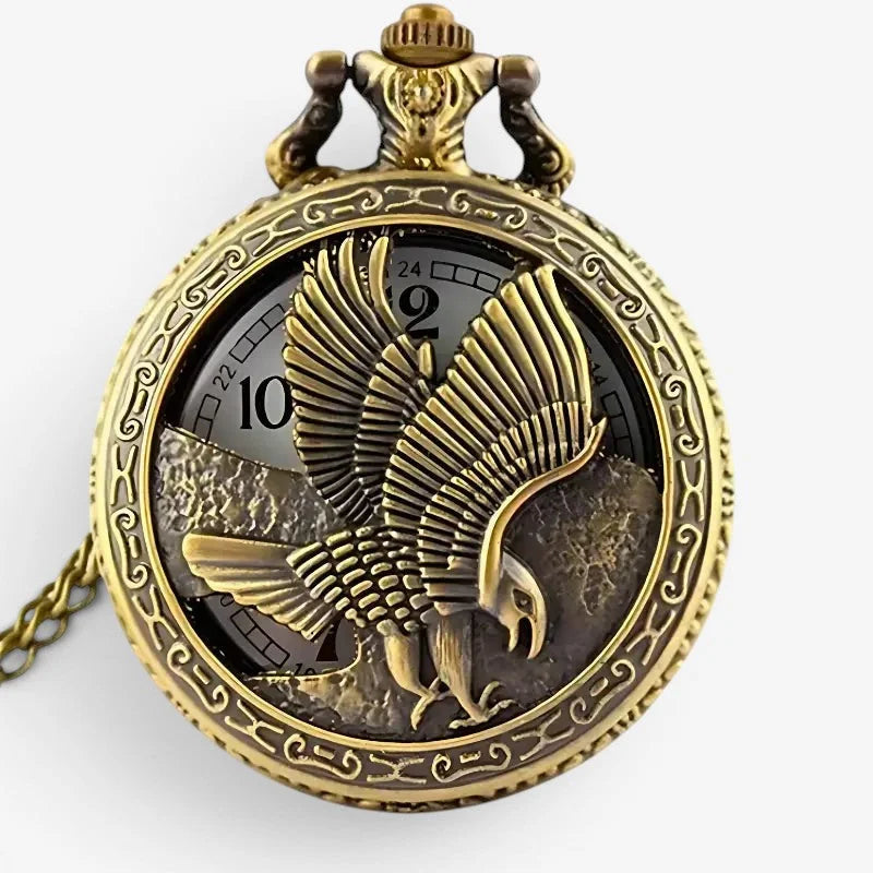 Antique gold-toned quartz eagle pocket watch with intricate filigree detailing around the circular face