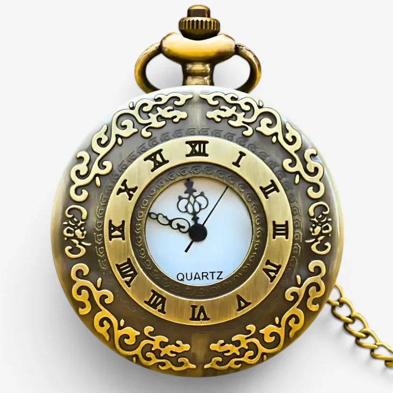 Antique gold-toned roman numeral pocket watch with ornate filigree and a light blue quartz movement face