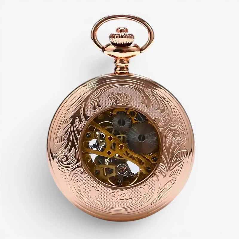 Rose gold roman numeral pocket watch with intricate floral engraving and visible mechanical gears on the front