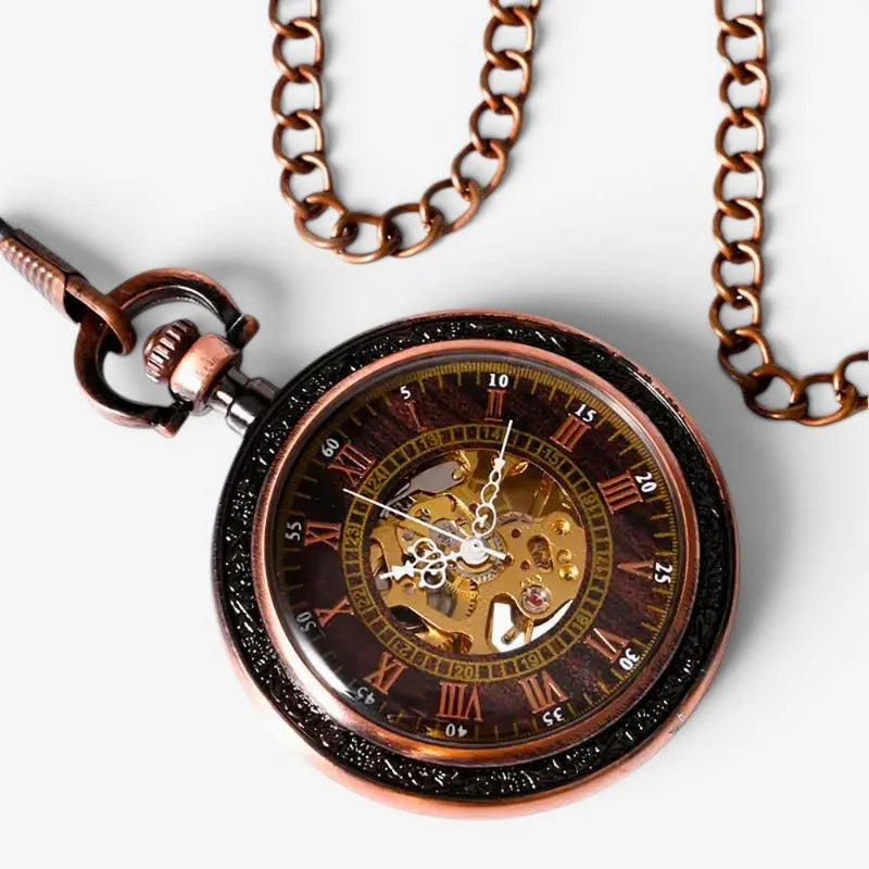 Rose gold steampunk pocket watch with antique bronze finish, visible internal gears, and roman numeral face markings