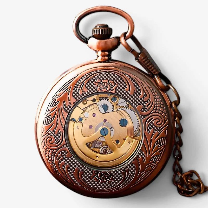 Rose gold sun pocket watch with antique bronze finish, intricate floral engraving, and exposed golden gears