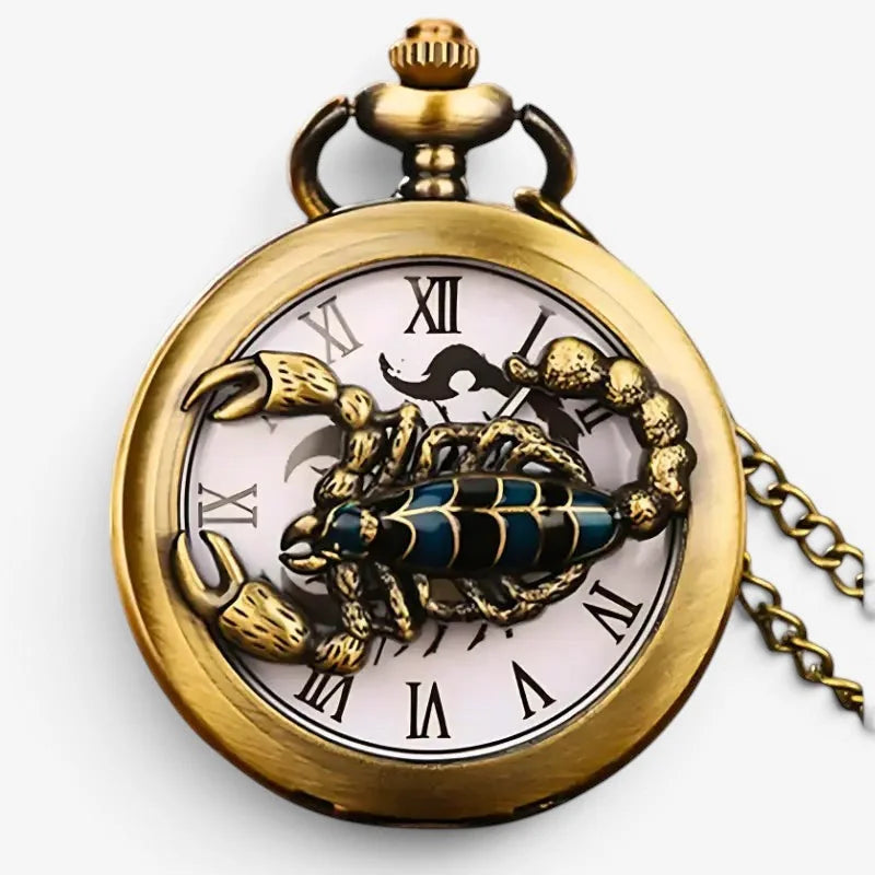 Antique gold-toned scorpion pocket watch with blue and black enamel detailing roman numerals and attached chain