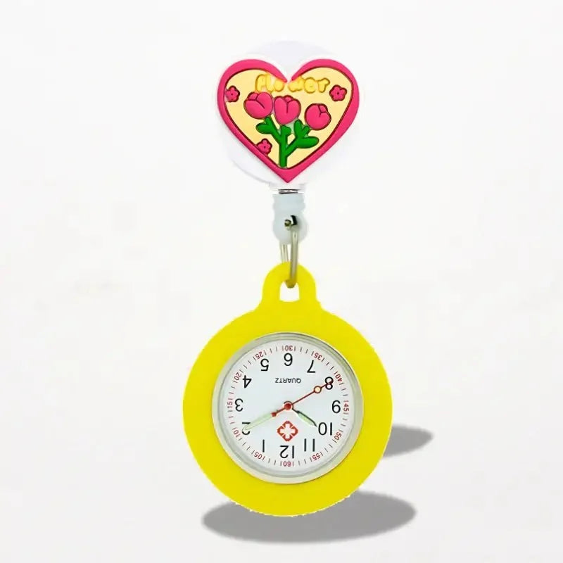 Bright yellow silicone nurse watch with a heart-shaped clip featuring pink tulips and gold flower lettering