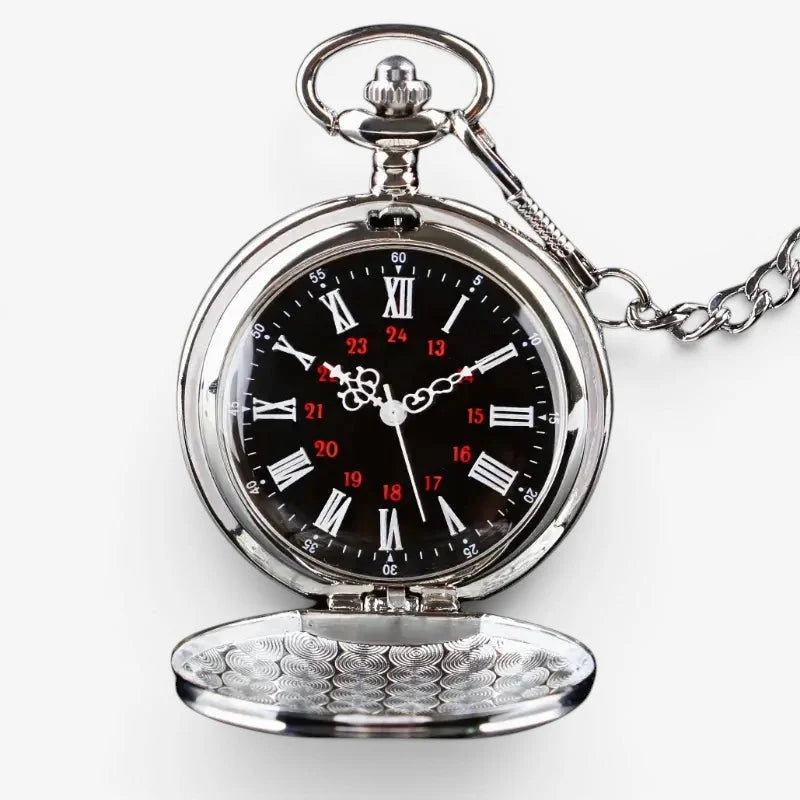 Silver engraved pocket watch with silver tone, black face, white and red roman numerals, and ornate attached chain