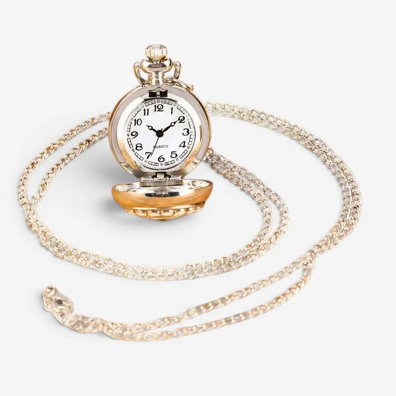 Gold-toned silver flower pendant watch with white face black numerals and ornate chain for elegant timekeeping