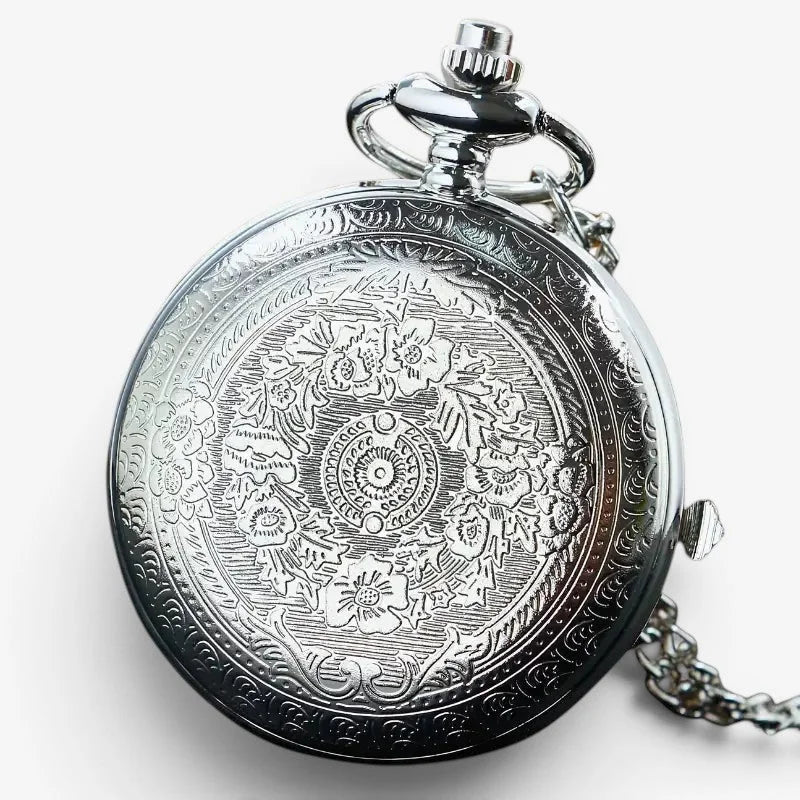 Silver hourglass pocket watch with polished metallic finish and intricate floral engravings on the back side