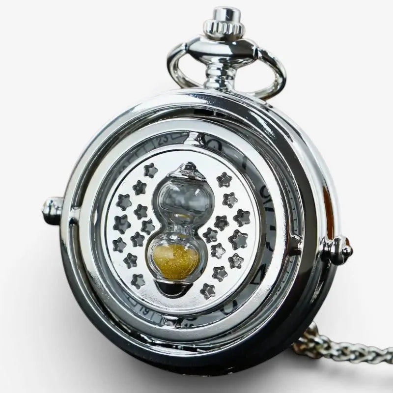 Silver hourglass pocket watch with silver tone rotating dial featuring hourglass design and star shaped cutouts