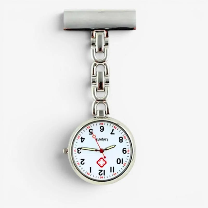 Silver nurse watch with silver tone case white face red numerals and hands and red medical cross at six o’clock position
