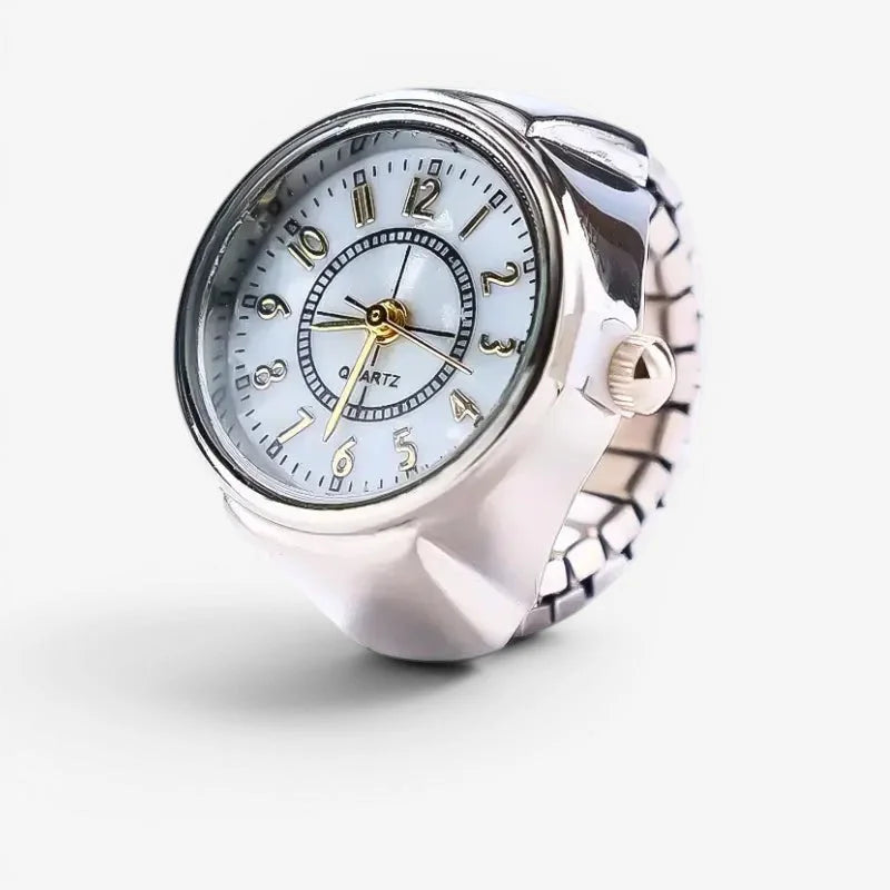 Silver ring watch with silver-toned stretchy band white dial and gold-tone hands and numerals
