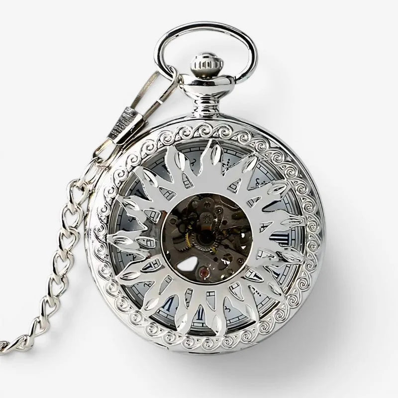 Silver sun pocket watch with intricate sunburst design and visible mechanical gears featuring a wearable chain