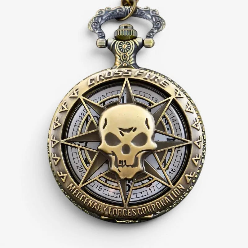 Antique brass skull pocket watch with ornate star design engraved crossfire mercenary forces corporation text