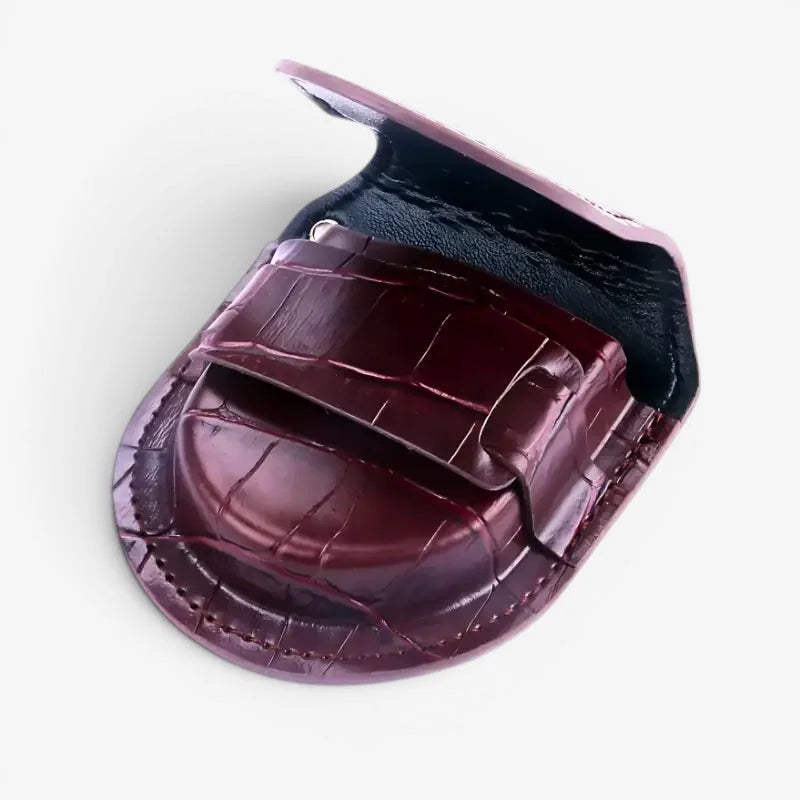A sleek burgundy crocodile-patterned leather steampunk pocket watch case with black interior lining