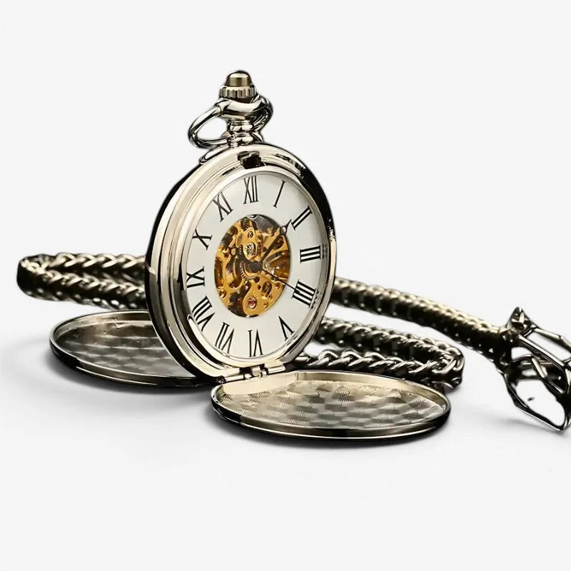 Sterling silver pocket watch with roman numerals and exposed golden gears on a braided metal chain