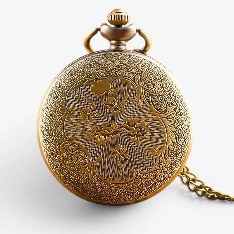 Antique gold-toned targaryen pocket watch with intricate floral and dragon engravings and matching chain
