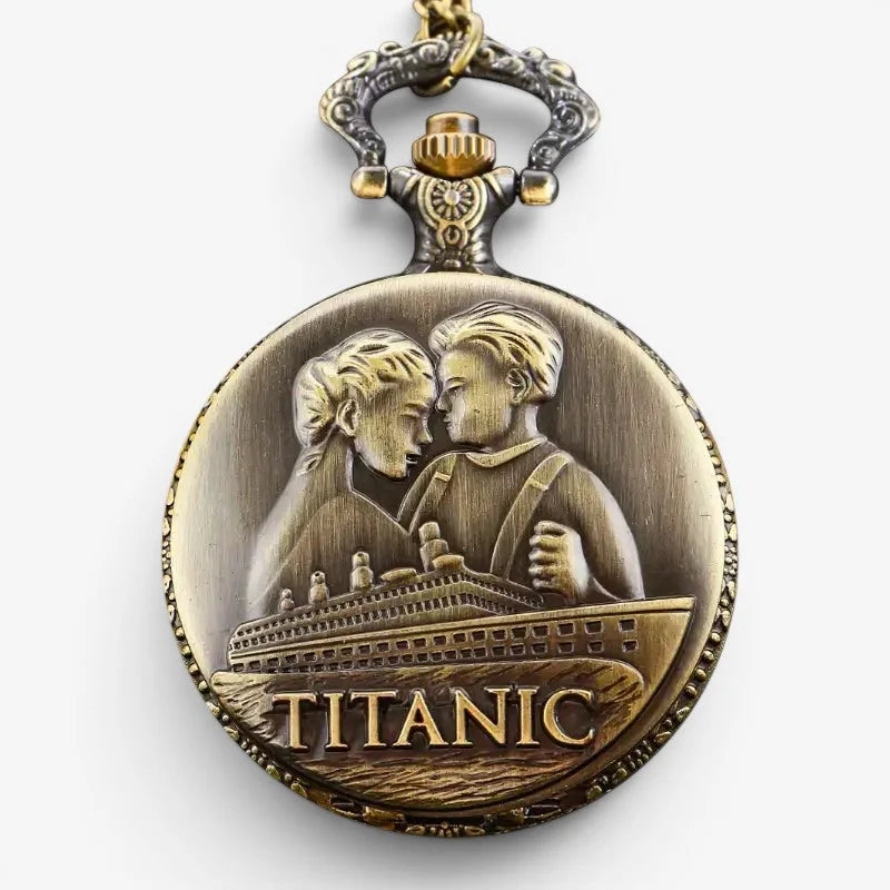 Antique brass-colored titanic pocket watch with a detailed relief of lovers embracing above the ship engraving