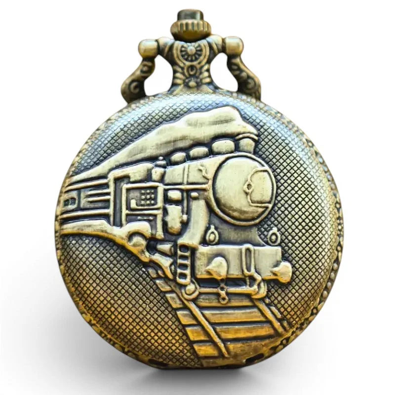 Antique brass-colored train pocket watch with detailed steam locomotive relief on its face, vintage collectible timepiece