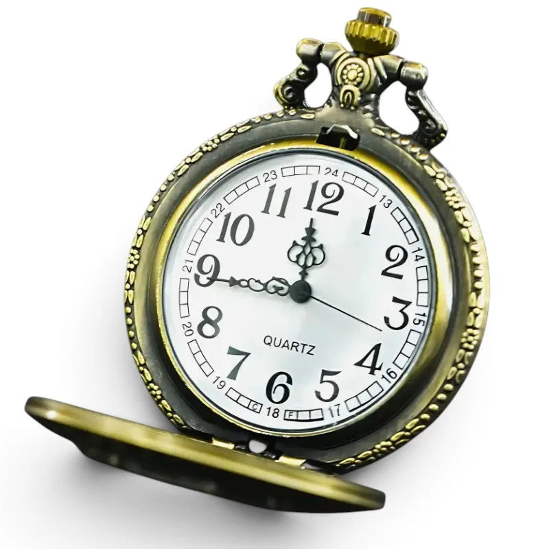 Antique-style brass train pocket watch with white face black numerals hands and ornate bezel detailing